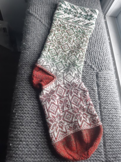 red/green gradient and white knitted Christmas Stocking